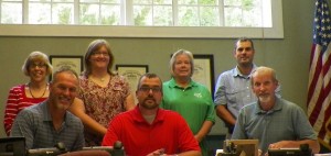 Meigs County Commissioners signed a Resolution honoring the 100th year of Extension work during their meeting on August 7, 2014.  Commissioners Mike Bartrum, Randy Smith and Tim Ihle are pictured with Meigs County Extension Staff Linda King, SNAP-Ed Program Assistant, Michelle Stumbo, 4-H Youth Development Educator & County Director, Debbie Watson, Office Associate and Marcus McCartney, newly hired Agriculture & Natural Resources Educator.  