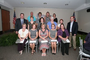 Shown pictured left to right, front row: Jane McFann, 20 years, Claudia Lyon, 20 years, Sharon Kight, 20 years, Dr. Lois Bosley, 20 years, and Sherry Asher, 20 years. Second row: Mr. Saunders, Abby Hussell, 25 years, Kathy Arrington, 25 years, Jean Webb, 20 years, Shelby Terry 20 years, and Mr. Cunningham. Third row, left to right: Vicki VanMeter, 25 years, Teresa McMann, 25 years, Kathy Arrington, 25 years, Amy McGuire, 25 years, and Debbie Manley, 25 years. 