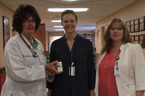  Left to right: Marla Haller, DO, FAPWCA, CMD, Post-Acute Care Services, Holzer Health System, donating three iPod Shuffles to Holzer Senior Care Center, with Leslie Shoecraft, NMT-BC, Rhythm-N-You, and Teresa Coffee, LNHA, Administrator, Holzer Senior Care Center.