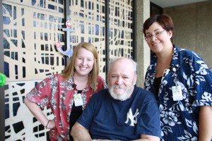 Tom Kimes, Holzer Inpatient Rehabilitation Unit Patient of the Year, center, and Ashley Coughenour, COTA, at left and Amanda West, LPTA, right, both of Holzer Inpatient Rehab Unit. 
