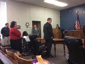 Jacques Daboni awaits the verdict while his attorneys stand for the jury to enter the courtroom. Daboni was found guilty on all counts. Photo by Carrie Gloeckner.